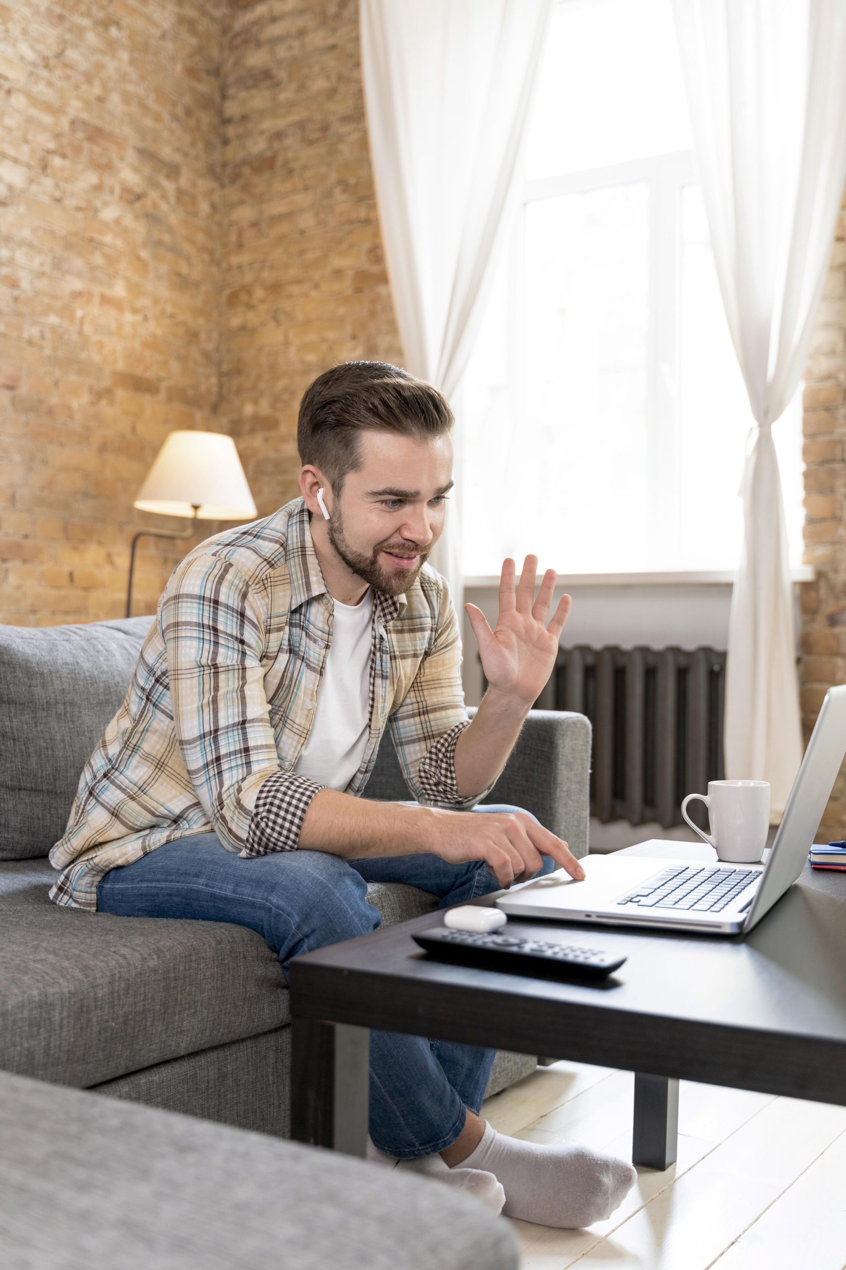man-home-having-videocall-with-family (1) man-home-having-videocall-with-family (1)
